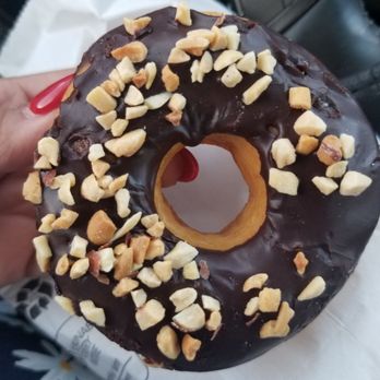 Babe's Doughnut - Classic chocolate donut topped with peanuts - Donuts Near Me - Bryan, Texas