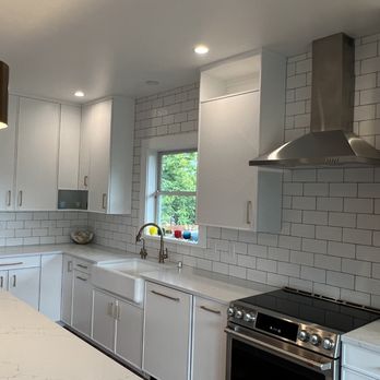 GoCo Construction - a kitchen with white cabinets and stainless steel appliances - General Contractors Near Me - Renton, Washington GoCo Construction - a kitchen with white cabinets and stainless steel appliances - General Contractors Near Me - Renton, Washington