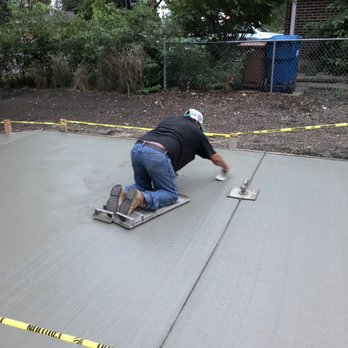 The Concrete Doctors - The prompt, friendly installer smoothing out the animal tracks - Masonry/Concrete Near Me - Elmhurst, Illinois The Concrete Doctors - The prompt, friendly installer smoothing out the animal tracks - Masonry/Concrete Near Me - Elmhurst, Illinois