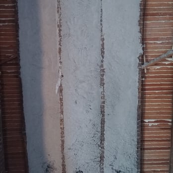 Sustainergy Cooperative - what dense packed wall looks like without drywall. Notice that it doesn't fall out or is loose - Insulation Installation Near Me - Cincinnati, Ohio