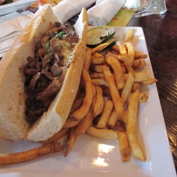 Tap House Grill - Per menu: A baguette STUFFED with braised beef. Featured as one of Chicago's bests! Looks like BREAD to me! - New American Near Me - Oswego, Illinois Tap House Grill - Per menu: A baguette STUFFED with braised beef. Featured as one of Chicago's bests! Looks like BREAD to me! - New American Near Me - Oswego, Illinois