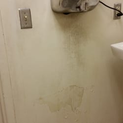 Unkle Odie's 121 - Are they drying off dirt that is sticking to the wall? Gross.