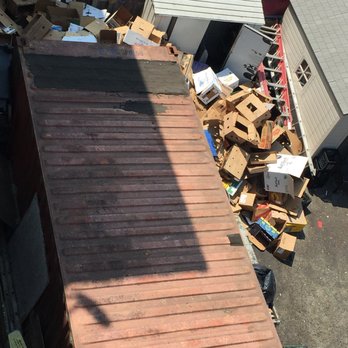 Cha Cha Cha - God only knows what's living in this pile of used wine and food boxes. - Caribbean Near Me - San Francisco, California