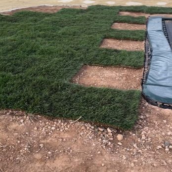 Sol Scapes - Sod being laid on top of rocks and weeds and uneven ground - Masonry/Concrete Near Me - Syracuse, Utah