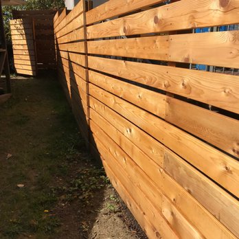 Heilman Deck & Fence Experts - Horizontal fence with 6" wide deck boards - Fences & Gates Near Me - Bothell, Washington