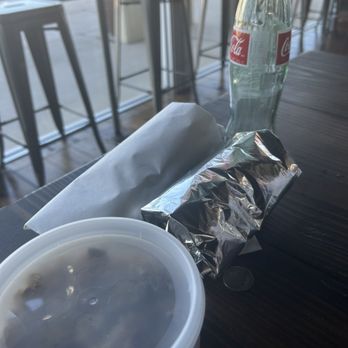 Bexar Barbecue - Left overs "To-go" set up - no bag/no sticker to keep the meats rolled up in the foil/paper they gave to roll it up in - Barbeque Near Me - Tomball, Texas