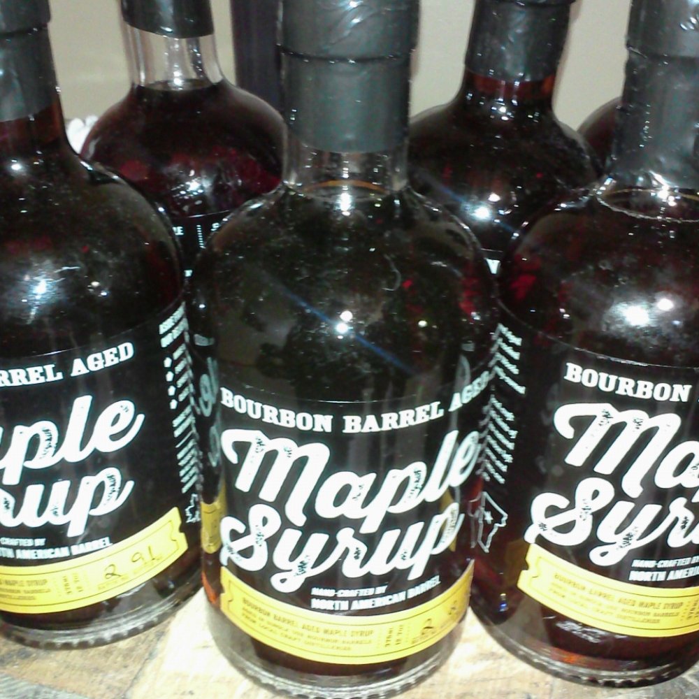 Black Button Distilling - Bourbon maple syrup is one of many diverse items you can get at Black Button. - Distilleries Near Me - Rochester, New York Black Button Distilling - Bourbon maple syrup is one of many diverse items you can get at Black Button. - Distilleries Near Me - Rochester, New York