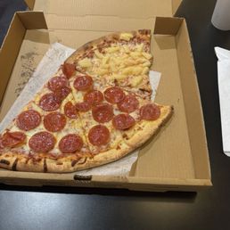 Two pepperoni, one Pineapple slice Two pepperoni, one Pineapple slice