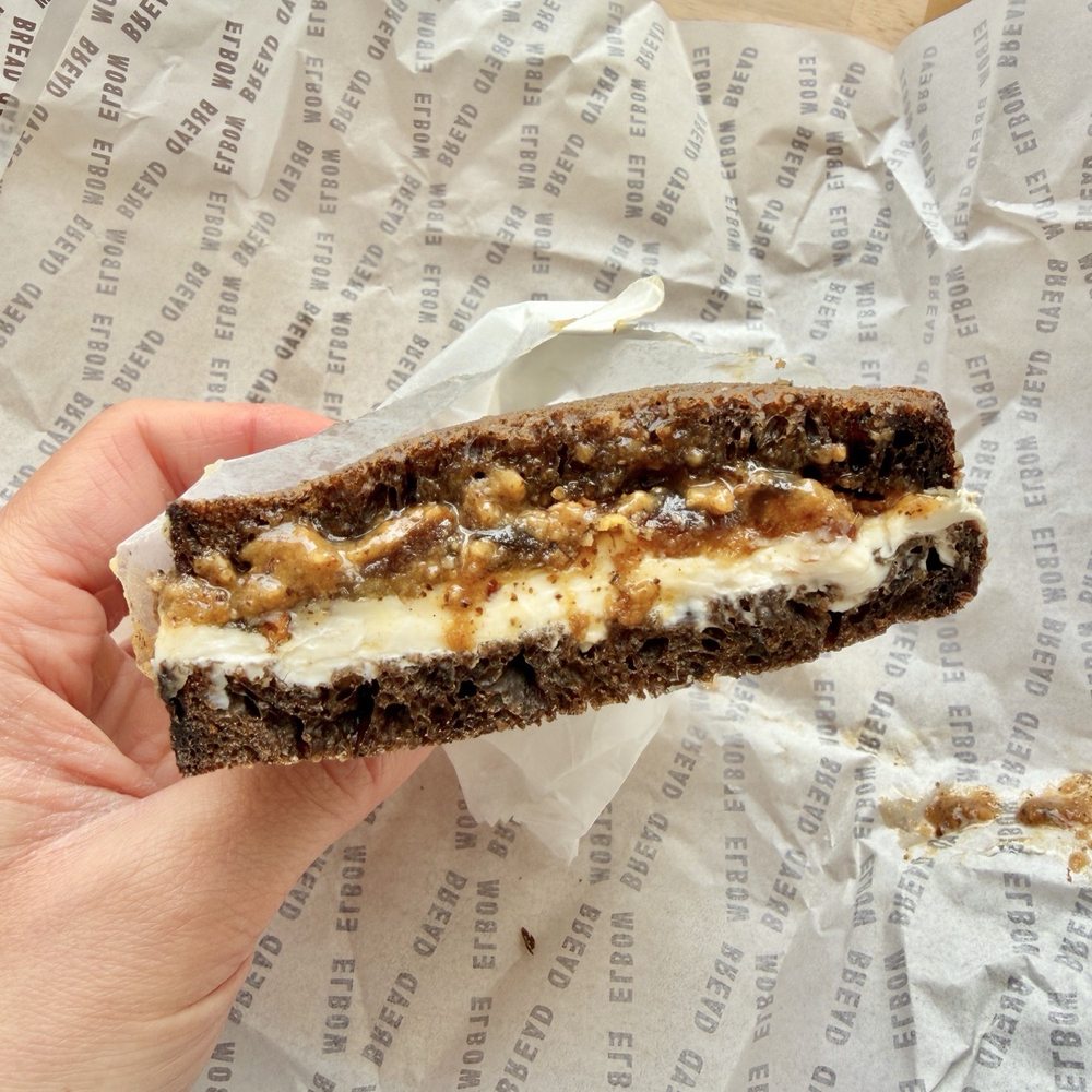 Elbow Bread - Walnut butter, cream cheese, and dates on black bread ($8 for this half sandwich)-- creamy, rich, and delish :) - Bakeries Near Me - New York, New York Elbow Bread - Walnut butter, cream cheese, and dates on black bread ($8 for this half sandwich)-- creamy, rich, and delish :) - Bakeries Near Me - New York, New York