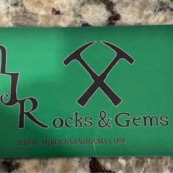 MJ Rocks and Gems - Business card font view Has logo and website