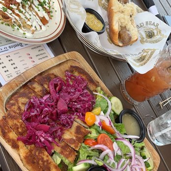 Wild Bear Tavern - Schnitzel salad, bratwurst with potato pancakes. - Breakfast & Brunch Near Me - Pigeon Forge, Tennessee Wild Bear Tavern - Schnitzel salad, bratwurst with potato pancakes. - Breakfast & Brunch Near Me - Pigeon Forge, Tennessee