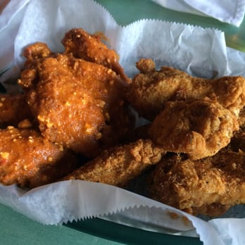 TomKen's Friendly Fried Chicken - Wings! The wings on the left fried with sauce & the wings on the right fried with dry rubbed. - Chicken Wings Near Me - Milwaukee, Wisconsin TomKen's Friendly Fried Chicken - Wings! The wings on the left fried with sauce & the wings on the right fried with dry rubbed. - Chicken Wings Near Me - Milwaukee, Wisconsin