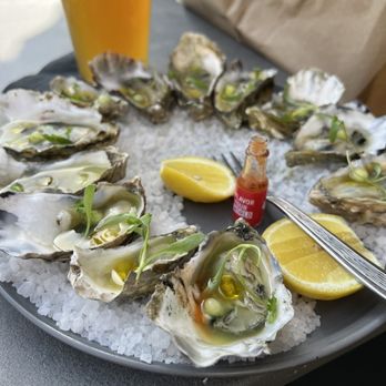 Oak - Oak oysters-fresh and clean. Tiny cucumber balls and vinaigrette well balanced - New American Near Me - Laguna Beach, California