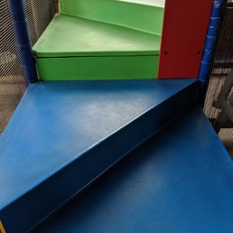 a blue and green play area