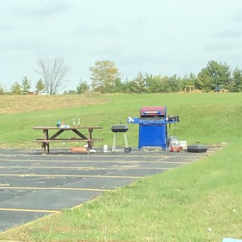 Don Q Inn - Garbage and cookout area in front where weekly residents cook their meals. - Hotels Near Me - Dodgeville, Wisconsin Don Q Inn - Garbage and cookout area in front where weekly residents cook their meals. - Hotels Near Me - Dodgeville, Wisconsin