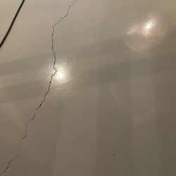 Concrete Floor Supply - Cracks in painted final surface that could have been addressed