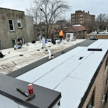 Midwest Pro Roofing - This is a modified roofing system overlay. The previous roof was badly damaged as shown in the picture - Roofing Near Me - Chicago, Illinois
