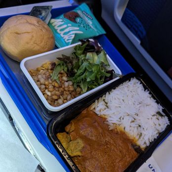 United Airlines - My choice of 'Butter Chicken with Cilantro Rice' was very good. The faro salad was too sweet. - Airlines Near Me - Buffalo, New York United Airlines - My choice of 'Butter Chicken with Cilantro Rice' was very good. The faro salad was too sweet. - Airlines Near Me - Buffalo, New York