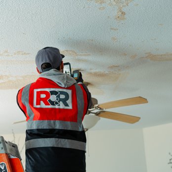 Rumsey Construction & Restoration - Technician inspecting residential water damage - Damage Restoration Near Me - Charlotte, North Carolina Rumsey Construction & Restoration - Technician inspecting residential water damage - Damage Restoration Near Me - Charlotte, North Carolina