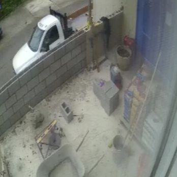 Badger Masonry - a white truck parked on the side of the road - General Contractors Near Me Badger Masonry - a white truck parked on the side of the road - General Contractors Near Me