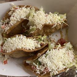 Small World Inn Bar & Grill - 4 crispy beef tacos with extra cheese ( Crispy tacos on Tuesdays only).