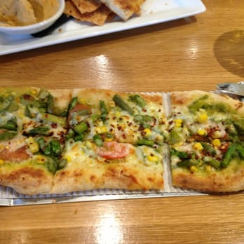 Crushed Red - Asparagus, corn, pesto pizza. It was heaven! - New American Near Me - Kirkwood, Missouri Crushed Red - Asparagus, corn, pesto pizza. It was heaven! - New American Near Me - Kirkwood, Missouri