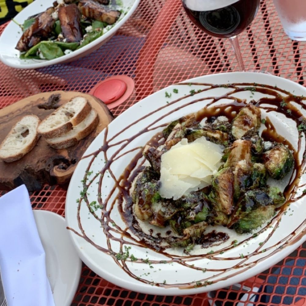 Grass Rootes - I had the Brussels sprouts (appetizer) and my friend had the pork belly salad. Everything was delicious! - New American Near Me - Culpeper, Virginia