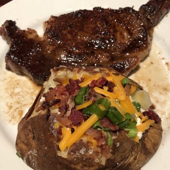 LongHorn Steakhouse - 12oz Ribeye with a loaded bake potato. - Steakhouses Near Me - Gallatin, Tennessee LongHorn Steakhouse - 12oz Ribeye with a loaded bake potato. - Steakhouses Near Me - Gallatin, Tennessee