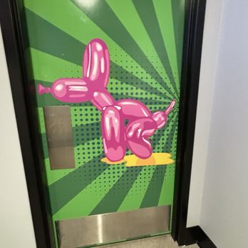 Smash Park - Women's restroom door. My son thought these were hilarious - Pickleball Near Me - La Vista, Nebraska