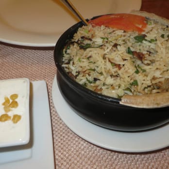 Babur - Lamb dum biryani, boondi raita  Scented with saffron, spices, browned onion, steamed in a sealed pot - Indian Near Me - London, XGL