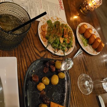 Mercat a la Planxa - Croquetas de bacalla (top right), blistered padron peppers (top middle), salt water taffy (top left), marinated olives (bottom) - Tapas Bars Near Me - Chicago, Illinois