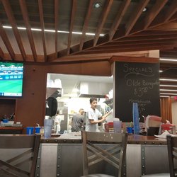 Howard's Pizza - Sitting in front of the cooks!