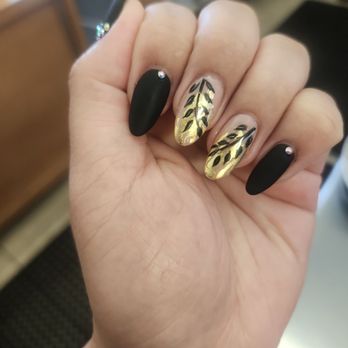Mimi Nails Salon - Matte black with gold rhinestones, black floral on gold flakes - Nail Salons Near Me - Aiea, Hawaii