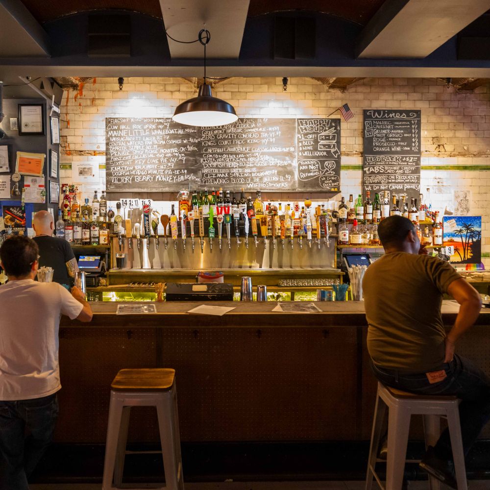 Barcade - three men sitting at a bar - Bars Near Me - New York, New York Barcade - three men sitting at a bar - Bars Near Me - New York, New York