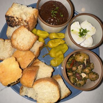Koma Cafe - a plate of bread, soup, and bread rolls - Coffee & Tea Near Me - Takoma Park, Maryland