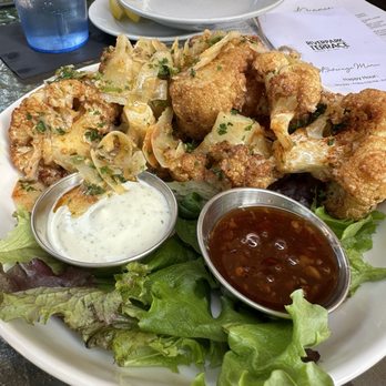 Riverpark Terrace - Roasted garlic Parmesan cauliflower is a MUST! - Bars Near Me - New Smyrna Beach, Florida
