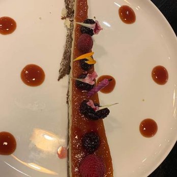 Amaru - Guayaba Cheesecake with a birthday candle - Latin American Near Me - Chicago, Illinois Amaru - Guayaba Cheesecake with a birthday candle - Latin American Near Me - Chicago, Illinois
