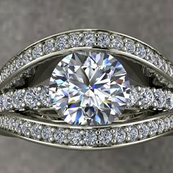 H Jewelers - Custom designed in 14kw gold with 2 ct. center, 1.5 ct. side diamonds.
