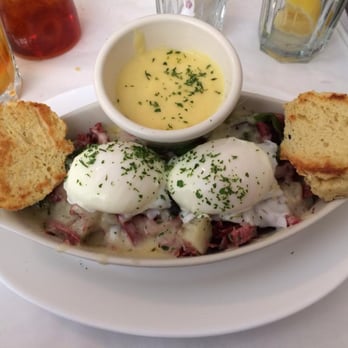 The Buttered Biscuit - Poached eggs over corned beef hash, Swiss cheese and asparagus with Hollandaise, flanked, of course, by two buttered biscuits. - New American Near Me - Bradley Beach, New Jersey The Buttered Biscuit - Poached eggs over corned beef hash, Swiss cheese and asparagus with Hollandaise, flanked, of course, by two buttered biscuits. - New American Near Me - Bradley Beach, New Jersey