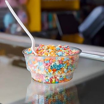 Dippin' Dots - n ice cream with a spoon in it - Ice Cream & Frozen Yogurt Near Me - Orange Beach, Alabama Dippin' Dots - n ice cream with a spoon in it - Ice Cream & Frozen Yogurt Near Me - Orange Beach, Alabama