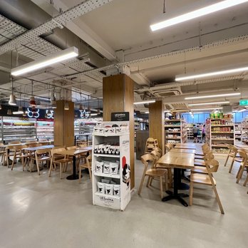 Japan Centre - Go down the stairs to the main area. They have a sitting area where one eat ordered or prepared food. - International Grocery Near Me - London, XGL