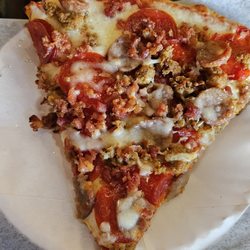Russo's House of Pizza - Meat Lovers Slice. They are big slices.