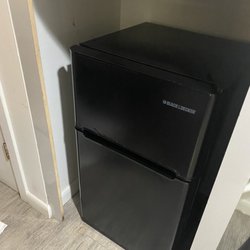 Lotus Boutique Inn & Suites - Tiny mini fridge for a "kitchenette". This kitchenette is like the wish version compared to our friends rooms.