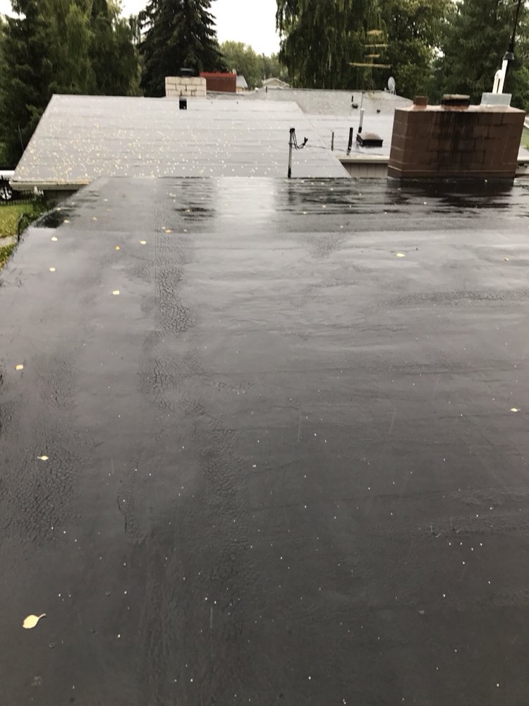 Slide of R & M Roofing