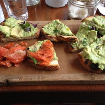 The Belgard Kitchen - Smashed avocado with on bread with side salmon and side poached egg. Tasty and light. - Tapas/Small Plates Near Me - Vancouver, British Columbia