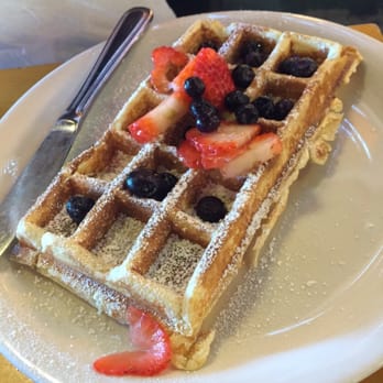 The Peach Cafe - Half of Belgian waffle with strawberries and blueberries - New American Near Me - Monrovia, California