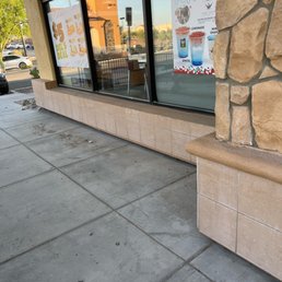 a storefront window with a sign on it