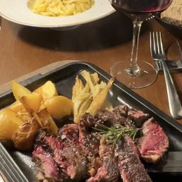 Tagliata di entrecote (steak, potatoes, fennel) and Tonnarello cacio de pepe (pasta with cheese & pepper)