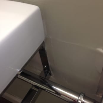 Barlow Hotel - Sink falling off wall. Broken and damaged drywall. - Hotels Near Me - Hudson, New York