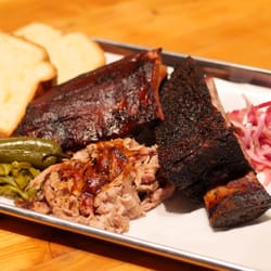 Brother John's Beer Bourbon & BBQ - From the Smoker - Family Style: Short Rib, Pulled Pork, Baby Back Ribs, Pickled Onion & Jalapeño, Texas Toast.